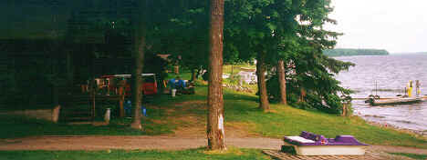 Panoramic View of Lake and Cabin