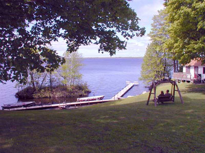 The view of Bowstring Lake from your cabin deck or the cedar swing is truly magnificent!